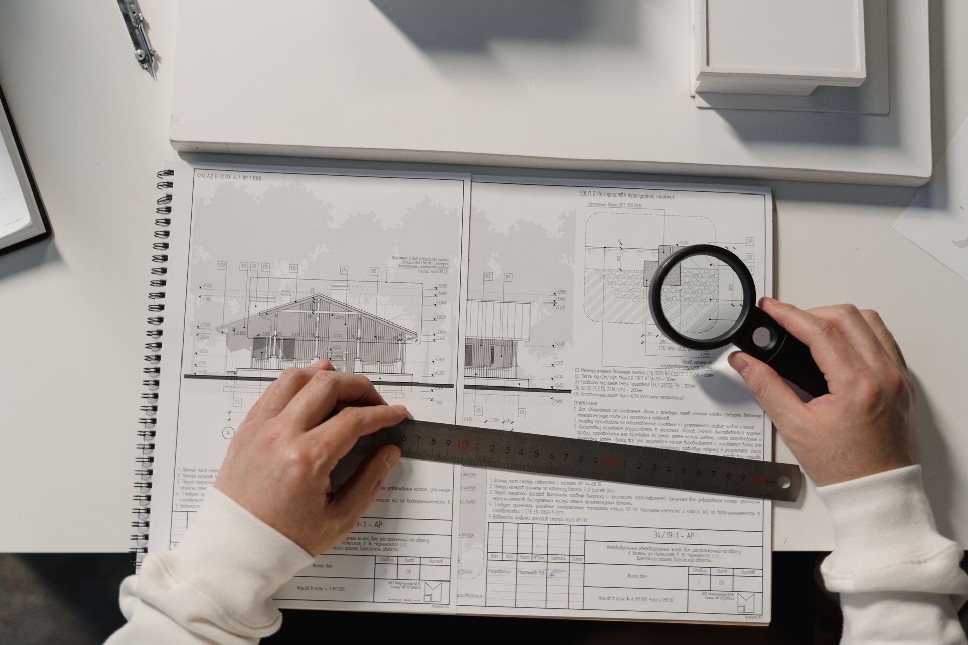 Construction estimator reviewing blueprints